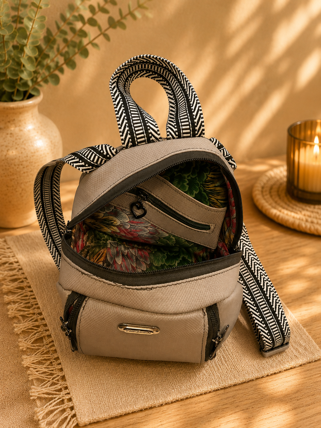 handmade gray vinyl small backpack interior pockets view