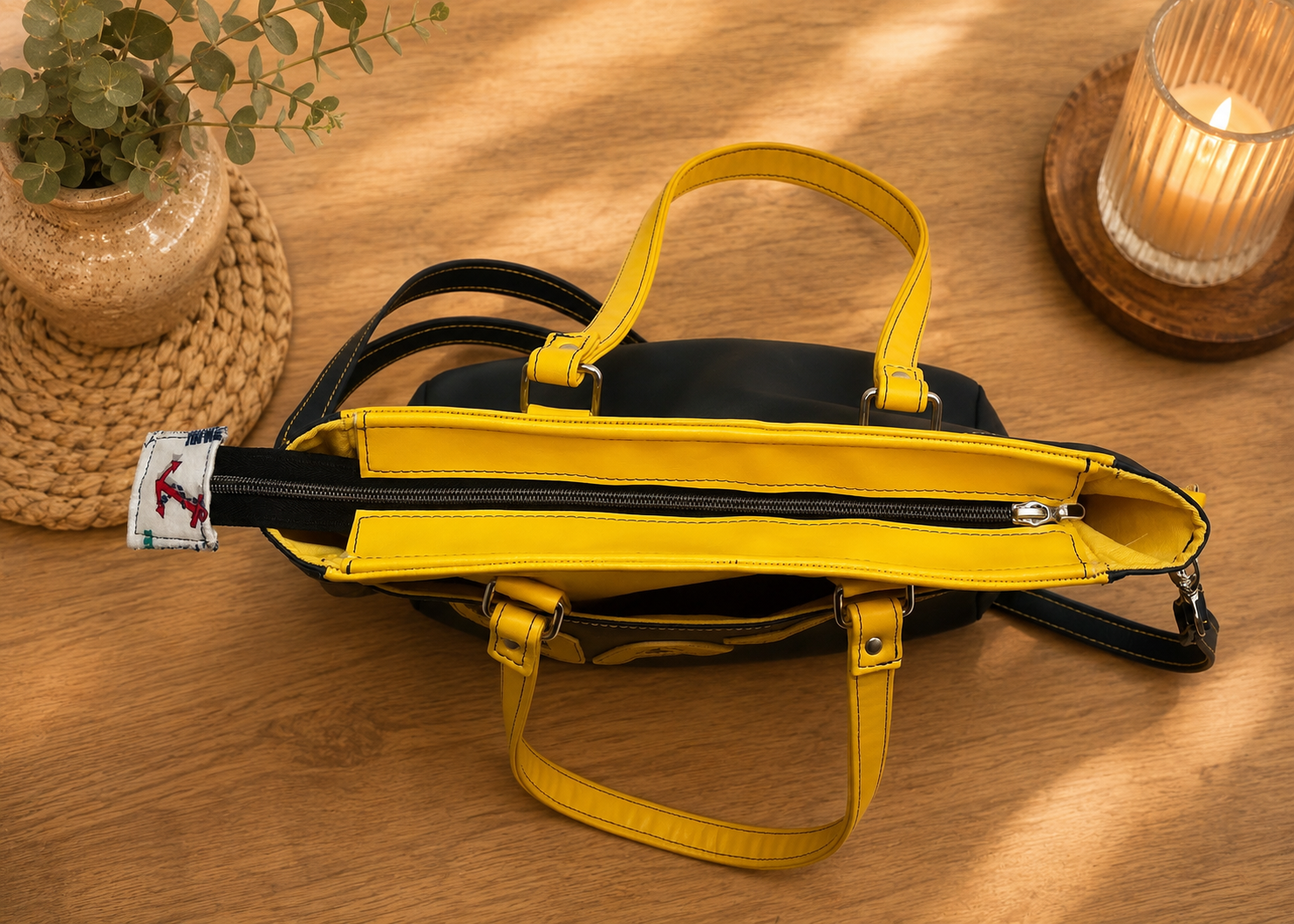 navy blue and yellow vinyl tote bag top zipper view